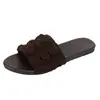 Pantuflas de verano para exteriores 2025 primavera-verano nuevas sandalias de una tira talla grande zapatos planos casuales de playa elegantes para mujer