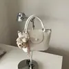 Diseño moderno, simple, gran capacidad, texturizado, estilo coreano, color liso, nuevo modelo 2026, bolso bandolera con colgante de bola de masa para mujer