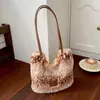 Bolsa feminina de pelúcia de grande capacidade transfronteiriça 2026 outono nova bolsa tote de ombro único para o trajeto diário em estilo casual