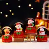 Nuevo producto transfronterizo: Bola de cristal pequeña navideña divertida con un lindo Papá Noel, adorno brillante, regalo navideño al por mayor