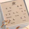 Pendientes de una semana para mujer, pendientes de trébol de cuatro hojas de lujo de alta gama, moda, pequeños, frescos, mini, conjunto de pendientes de una semana