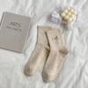 Outono e inverno novo cor sólida pequeno bordado de amor meias de cano básicas estilo acadêmico meias infantis versáteis estilo acadêmico meias femininas