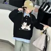 Camiseta Base para Meninas Outono 2025 Nova Moletom Falso de Duas Peças com Bordado de Cachorro para Crianças Maiores Doce Pulôver Raglan