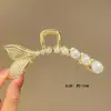 2025 Estilo Coreano Aleación Galvanizada Triángulo Geométrico Pinza de Tiburón Accesorio para el Cabello de Mujer Yiwu Fresco y Dulce Accesorio para la Cabeza