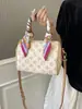 Bolso de hombro cruzado clásico de monograma de alta gama, bolso de mano Boston versátil, bolso almohada, bolso cilíndrico simple casual
