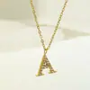 Acessórios de Colar Europeus e Americanos Transfronteiriços com Zircônia de 26 Letras Aço Titânio Feminino Banhado a Ouro Pingente Não Desbota Atacado