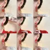 Pendientes festivos de Año Nuevo rojos, pendientes de año de nacimiento de dragón femenino, pendientes de diseño de nicho de alto sentido, pendientes de Año Nuevo de otoño e invierno