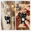 Llavero de Gato Cruzado de Dibujos Animados Transfronterizo Llavero de Acero Inoxidable Divertido de Dibujos Animados Colgante de Gato Negro Cruzado