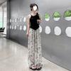 2024 Nova Calça de Perna Larga de Seda Gelo Feminina Verão Fina Dape Estampada a Tinta Estilo Preguiçoso Protetor Solar Calça Casual