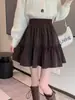 Saia feminina 2024, nova moda primavera, saia cruzada em A, saia curta, cintura alta, look slim, saia ponte