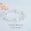 Pulsera Irregular de Cristal Blanco Natural Guan Yu con Flor de Ágata Roja, Pulsera Irregular para Transmisiones en Vivo Comercio Electrónico Venta al por Mayor S5091901