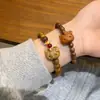 Nuevo brazalete de gato de madera de dibujos animados chinos lindo con cuentas cuerda elástica ajustable brazalete personalizado brazalete ajustable