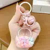 Desenho animado de areia movediça urso dos sonhos menina chaveiro cor de leite em pó boneca fofa pingente de bolsa casal presente pequeno atacado