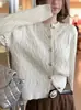 Cardigan de punto para mujer, otoño nuevo, suave y acogedor, diseño retorcido puramente deseable que reduce la edad, con pequeños botones dorados