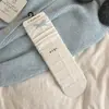 Calcetines dulces de lazo para mujer, calcetines de media pantorrilla para otoño e invierno, calcetines apilados de encaje retro japonés, calcetines grises y azules para mujer