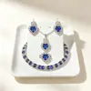 Collar con colgante rosa en forma de corazón que no se decolora para mujer, versátil, joyería de alta gama para mujer, juego de cuatro piezas: collar, aretes, anillo, pulsera