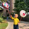 Suministro de origen directo de fábrica nuevos globos redondos de película de aluminio de dibujos animados para empujar el globo de papel de aluminio para la calle