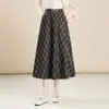 Falda de cuadros elegante línea A para mujer, nuevo estilo otoño e invierno 2026, de cintura alta, que cubre la cadera, de longitud media, elegante, adecuada para ir al trabajo, con un dobladillo amplio