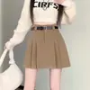 Outono e inverno de 2024 novo estilo coreano estilo universitário solto afina corduroy saia midi plissada em A cintura alta anti-exposição