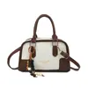 Bolsa de mão elegante e sofisticada, design de bolsa almofadada, moda outono 2026, bolsa de ombro simples e casual, bolsa transversal moderna para o dia a dia