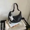 Bolso Bandolera Estilo Nuevo Verano Exquisito 2026 Bolso Versátil para Mujer Casual Bolso Dumpling Estilo Coreano Textura Simple Bolso de Viaje