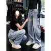 Calça jeans azul lavada de corte slim com perna curva para homens, estilo americano de verão, estilosa e sofisticada, calça de trabalho estilo harém