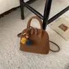 Bolsos Retro de Gama Alta Transfronterizos para Mujer Otoño e Invierno 2025 Nueva Moda Bolso de Hombro Único Bandolera Popular Portátil Bolso Tipo Concha