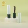 Atacado de Cosméticos: Pomada Lithospermum, Pomada Herbal, Protetor Labial Boca Plana Giratório, Protetor Labial Rachado, Tubo de Cera Labial, Materiais de Embalagem Cosmética de Preenchimento Direto