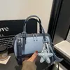 Bolso de bloqueo de color de nicho de comercio exterior súper popular para mujer, nuevo bolso cruzado versátil de moda 2026, bolso de mano, bolso Boston