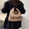 Bolsa de Mão Tendência Transfronteiriça Feminina 2025 Novo Estilo de Inverno Costura Cor Contrastante Bolsa de Ombro Mochila para o Trabalho