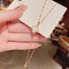 Collar de Acero de Titanio de Trébol de Cuatro Hojas Micro-incrustado de Doble Cara Nuevo 2023 para Mujer con Sentido Avanzado de Diseño Nicho, Cadena para Clavícula que no se Decolora