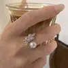 Anillo de oro real de 18k bañado con circonita y perla en forma de gota de agua, anillo de índice abierto de nicho de alta gama, anillo simple y versátil