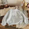 Conjunto de suéter para niña coreano 2026 primavera y otoño nuevo elegante falda tutú suéter de punto con lazo para niños conjunto de dos piezas