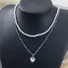 Collar con colgante de amor estéreo Dongdaemun de Corea del Sur, cadena de clavícula con corazón que combina con todo, colgante personalizado de moda que combina con todo.