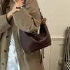 Bolso de Mujer Estilo Simple Sensación de Viaje al Trabajo Bollo 2026 Hombro Único Versátil Moda Gran Capacidad Extremadamente Nuevo Estilo Bolso Cruzado Otoño