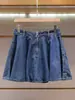Shenzhen Nanyou Moda Femenina de Gama Alta Verano Nuevo de Moda Chaleco de Mezclilla Adelgazante + Conjunto de Falda