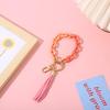 Nuevo llavero acrílico de gran venta, pequeño colgante de resina, pulsera con borla, llavero de moda, colgante para bolso de mujer.