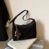 Bolsa para lonchera de axila relajada coreana nicho retro patchwork de gamuza bandolera de un solo hombro bolso de bola de masa estampado de leopardo moderno