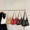 Bolso Tejido Vintage para Mujer 2026 Nuevo Nicho de Gama Alta Bolso de Hombro para el Trabajo Bolso Tote Madre e Hija Moderno