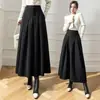 Nueva falda larga de lana de cintura alta para otoño e invierno con pliegues amplios, efecto de cubrir la cadera y adelgazante, en color café