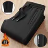Novas calças casuais masculinas de inverno com forro de fleece, calças esportivas da moda de corte solto com bolsos, calças jogger com zíper, calças de moletom de perna reta