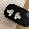 Pendientes de flor de circonita pavimentada tipo súper hada, de alta gama, para mujer, pendientes esmaltados retro franceses, pendientes de lujo ligero al por mayor
