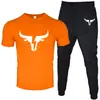 T-shirt Masculina de Manga Curta e Calça Suit Casual Venda Quente Transfronteiriça Gola Redonda Cor Lisa Roupa Esportiva Casual com Estampas e Impressão