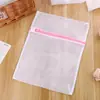Fabricantes de Anhui saco de lavanderia de malha grossa rosa com zíper borda de malha grossa saco de malha para lavanderia grosso saco de lavagem atacado