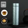 Taza aislada con recubrimiento de titanio, acero inoxidable 304, pintura de escamas de hielo, separación de té y agua, taza de té de viaje portátil para hombres y mujeres