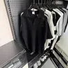 Top de Malha Respirável com Recortes de Verão para Homens Design Casual Solto Retro Americano Gola Lapela Manga Curta Tendência
