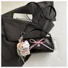 Nuevo Bolso de Mano Cilíndrico de Lunares Elegante para Mujer 2026 Modelo Nuevo Lindo de Alto Valor con Lazo Bolso Cruzado para Salidas