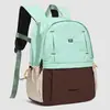 Mochila de estudiante para el día a día con bloqueo de color estilo dopamina transfronteriza, mochila ligera de gran capacidad para viajes al aire libre para mujer