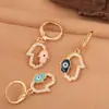 Europa y Estados Unidos moda transfronteriza ojo de diablo palma pendiente de gota de oreja modelado personalidad hermoso hip-hop temperamento aretes de clip para oreja venta al por mayor