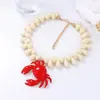 Collar de aleación con colgante de cangrejo con gota de aceite, perlas de gota de agua, estilo marino de verano europeo y americano, para mujer, versátil, de nicho